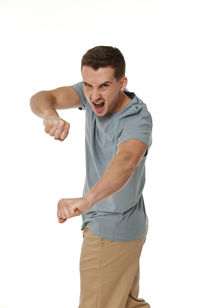 Photo angry bearded man shouting on white studio background