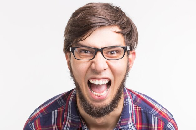 Angry bearded man on white background