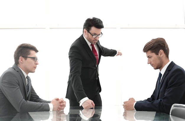 Angry boss fires an incompetent employeethe concept of professionalism