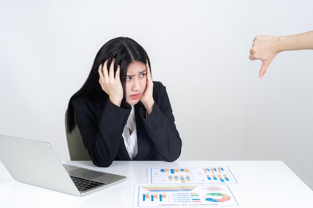 Angry boss point fingers blaming to Asian business woman employee at office place Business concept
