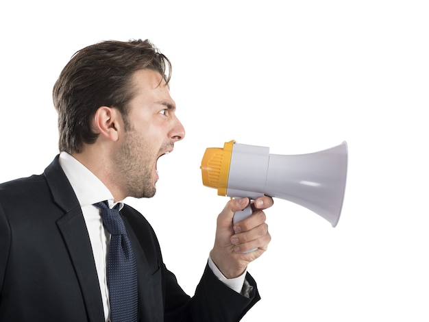 Angry business boss shouting with his megaphone