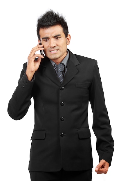 Angry businessman on the phone