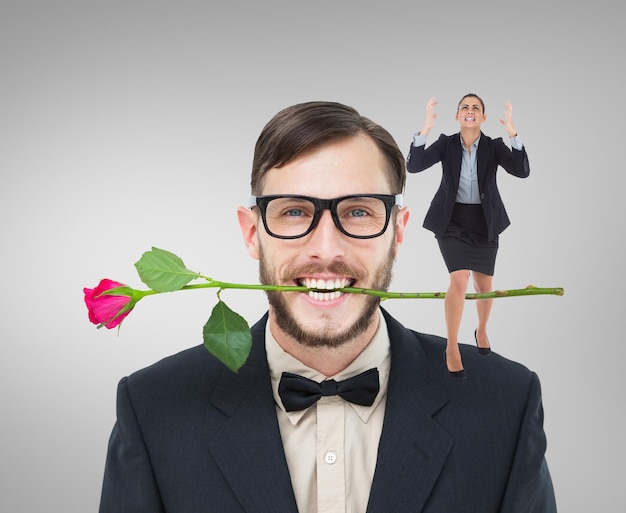 Angry businesswoman gesturing against grey vignette