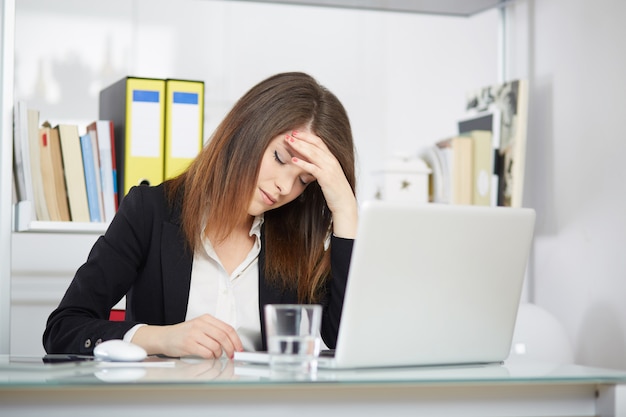 Angry businesswoman in office