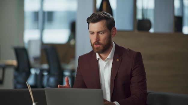 angry consultant reacting failure in office stressed businessman working laptop