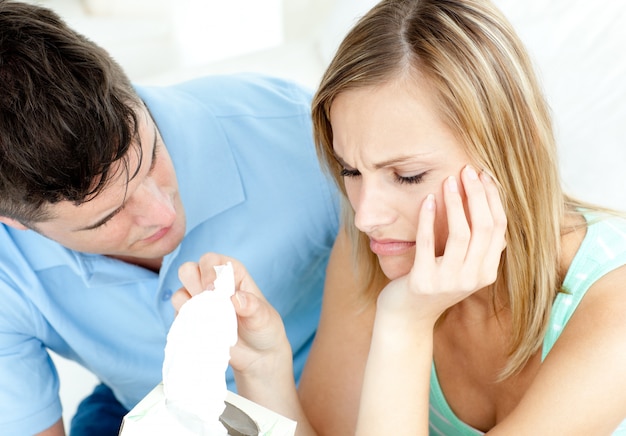 Angry couple having an argue in the living-room 