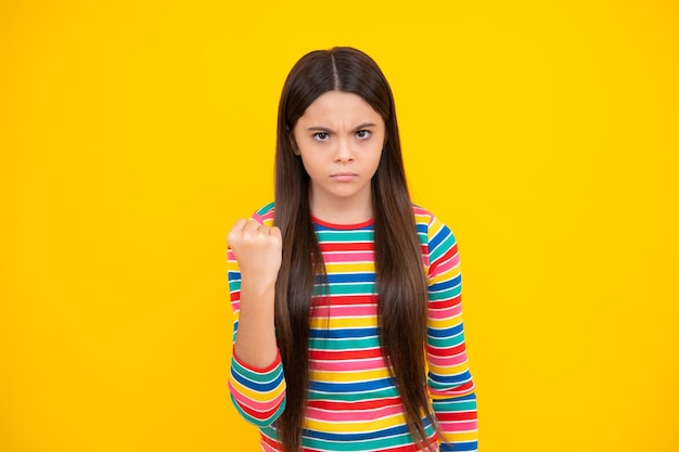 Angry face upset emotions of teenager girl Angry portrait young girl having nervous breakdow Negative kids emotions facial expressions feelings bad attitude