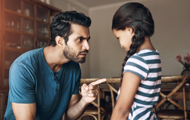 फोटो angry father and kid with scolding in punishment for communication behaviour and problem at home frustrated man and parent with parenting of little girl for argument trouble and discipline