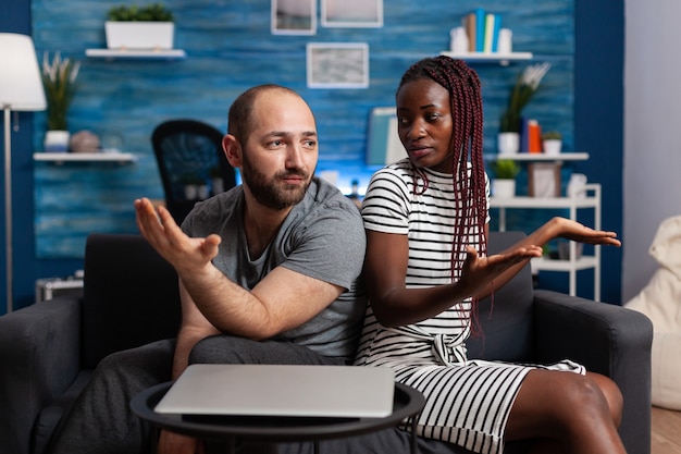 Angry interracial couple having argument and dispute