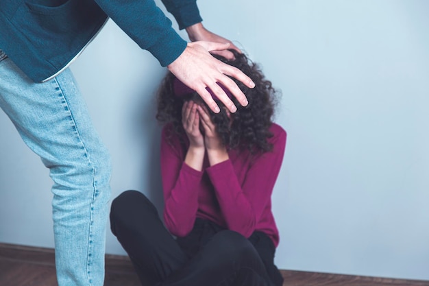 angry man beat sad woman