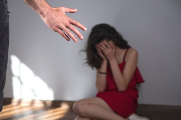 angry man beating woman