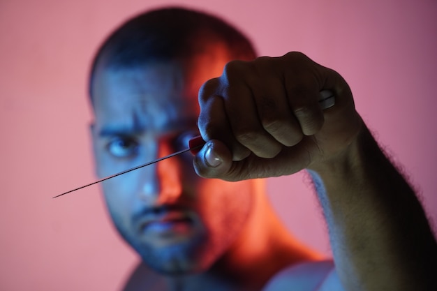 Angry man holding a knife