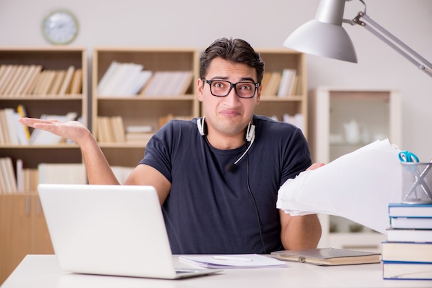 Angry man with too much paperwork to do