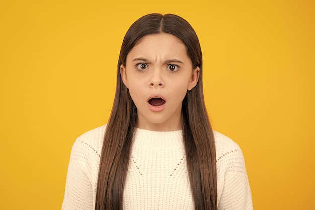 Angry teenager girl upset and unhappy negative emotion cute young teenager girl against a isolated background studio portrait of pretty beautiful child