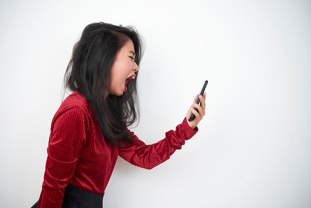 Angry woman talking on phone