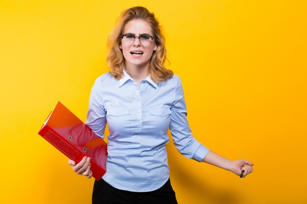 Angry woman with big folder