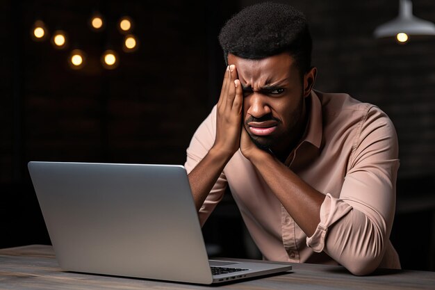 Angry young African American looking at laptop Generative AI