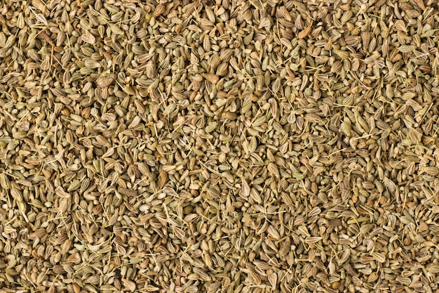 Anise seeds spice as a background, natural seasoning texture