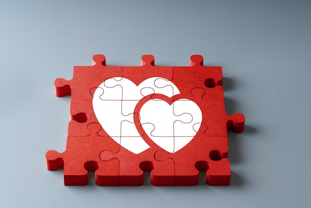 Photo anniversary, wedding and valentine day in puzzle concept top view