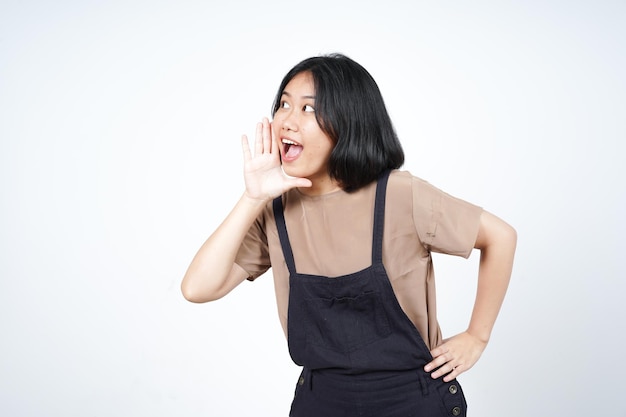 Announcement with hands over mouth of Beautiful Asian Woman Isolated On White Background