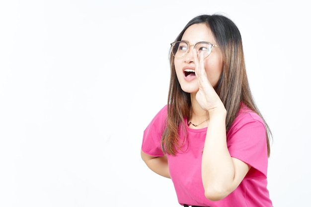 Announcement with hands over mouth Of Beautiful Asian Woman Isolated On White Background