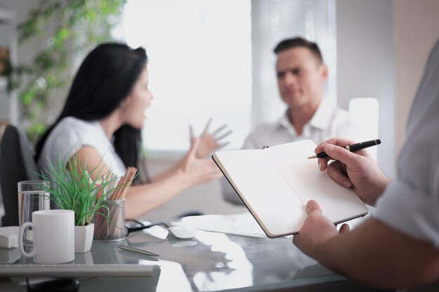 Photo annoyed disappointed customers clients couple holding paper complain on bad contract