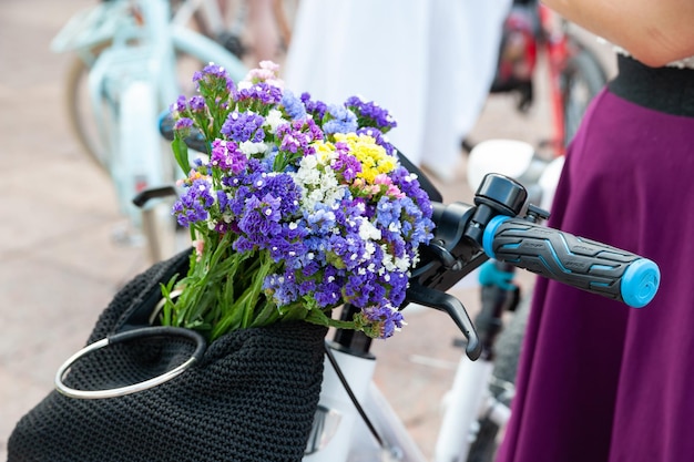 The annual women's bike parade Basket with colorful flowers decorate the bike Creative decoration