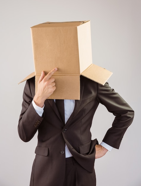 Anonymous businessman touching his chin