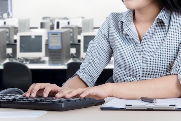 Anonymous businesswoman with computer