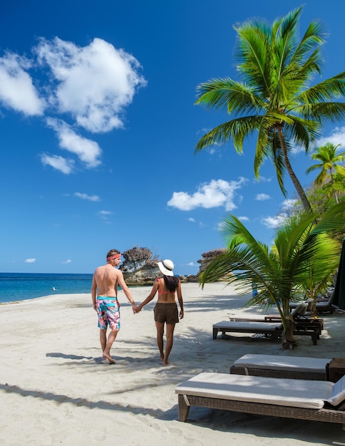 Anse chastanet beach st lucia caribbean island tropical st lucia couple walking at the white beach