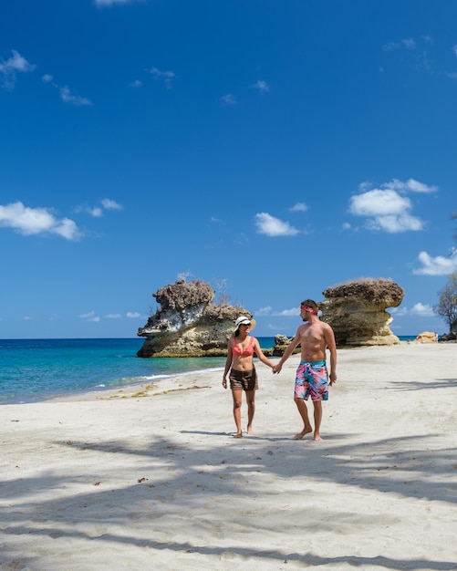 Anse chastanet beach st lucia caribbean island tropical st\
lucia couple walking at the white beach