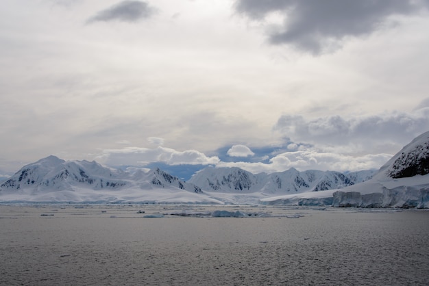 Antarctic landscape with glacier and mountains