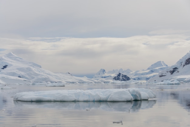 Antarctic landscape with iceberg