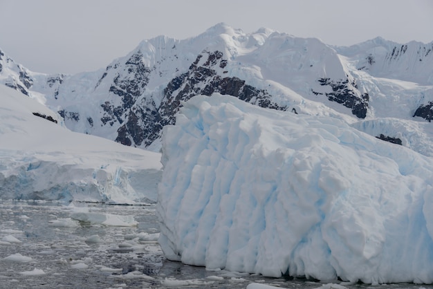 Antarctic landscape with iceberg