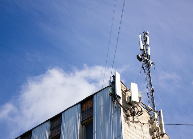 Antennas and telecommunication devices on the building Devices for communication equipment on the roof of a building structure