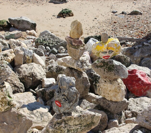 Anthropomorphic face painting on rocks