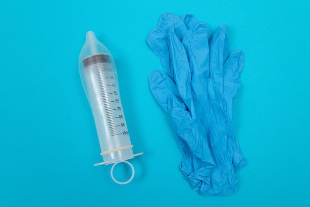 Anti vaccination concept  syringe in a condom