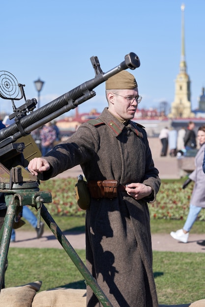 Antiaircraft gunner with a machine gun at victory day holiday onst petersburg