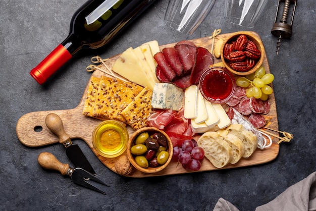 Antipasto board with prosciutto salami crackers cheese