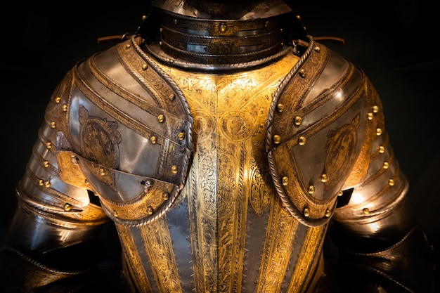 Antique armour on black background Concept for security safety and fantasy