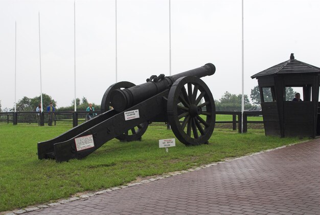 antique black metal cannon in the museum