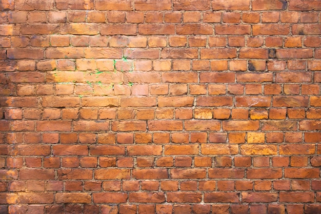 Antique brick wall vintage texture of red stone blocks