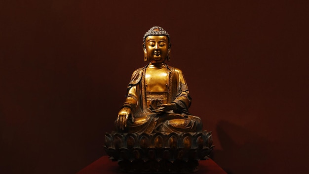 an antique buddha statue in the lotus position symbolizing enlightenment and nirvana the stone or