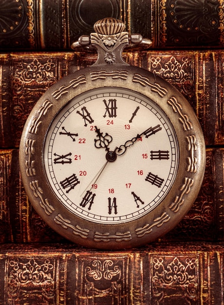 Antique clock dial close-up. Vintage pocket watch.