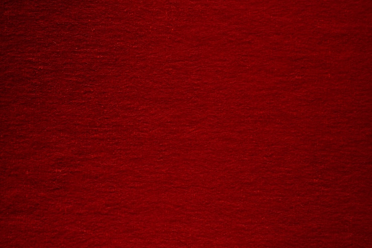 Photo antique colored paper in red. old vintage design. blank template, christmas texture