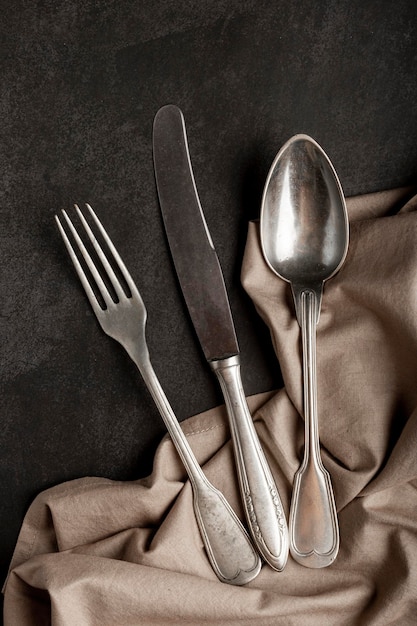 Antique cutlery on the table Vintage cutlery