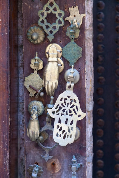 Antique door knockers for sale at a Moroccan souk