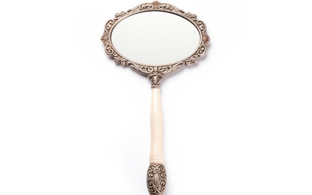 Photo antique hand mirror with ivory on white background