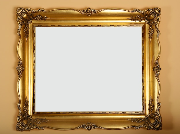 Antique old gold frame on the wall