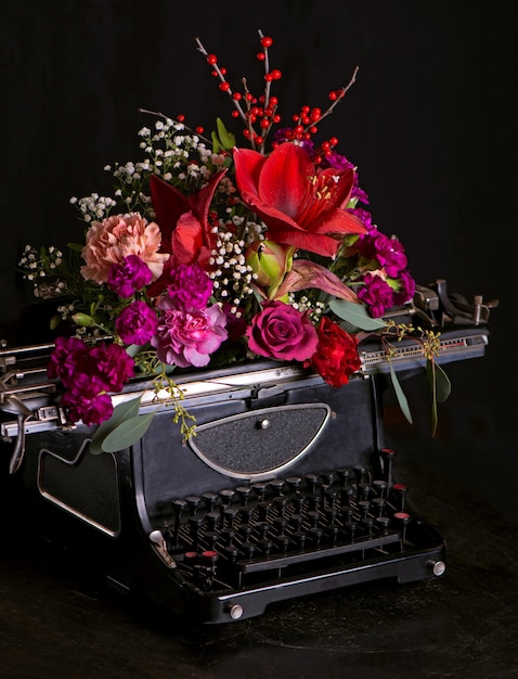 antique printing press and bright flowers